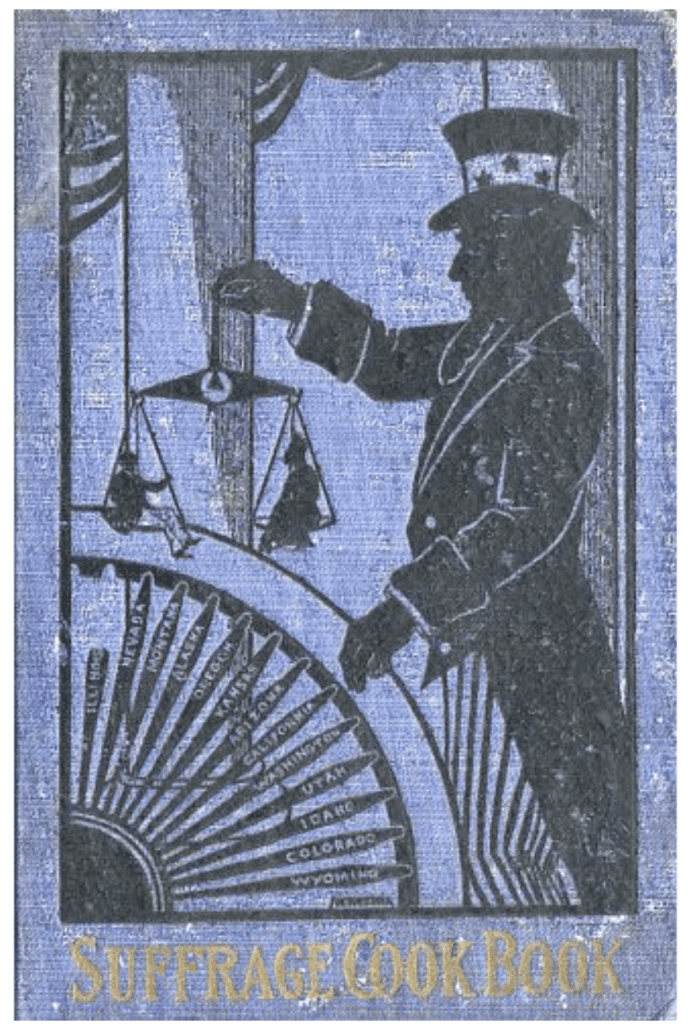 The cover of The Suffrage Cook Book is a perriwinkle blue with gold lettering. It features a man holding scales in one had and a wheel in the other.