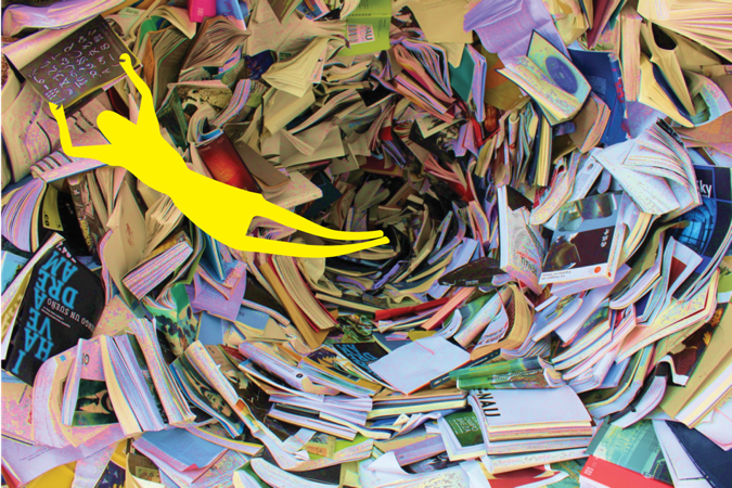 Photo of person falling into a tunnel of books.